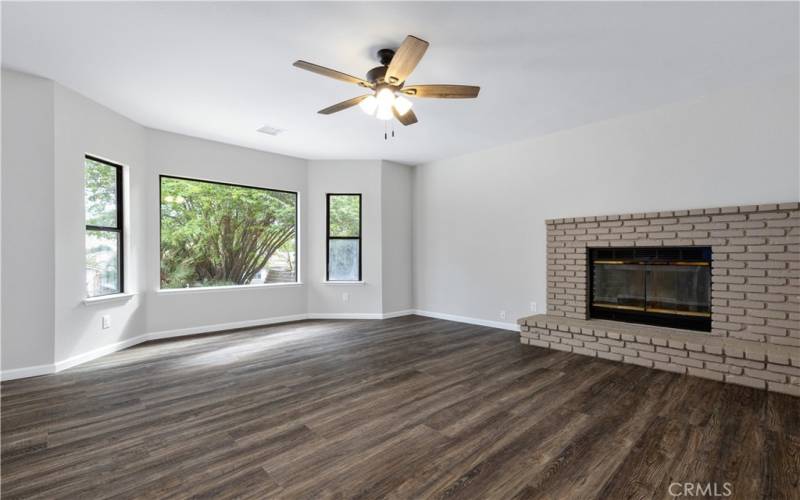 Huge family room off living room. Views of your mature landscape.