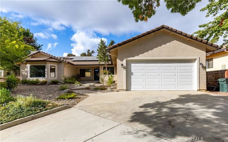 Newly finished garage including insulation, sheet rock and paint. The entire home inside and out is freshly painted with soft neutral colors. Solor system you see here is fully paid ! That is a huge savings for the new home owner!