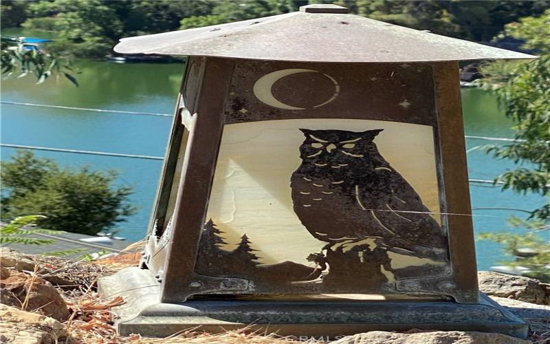 Art Deco owl lamp with lake view