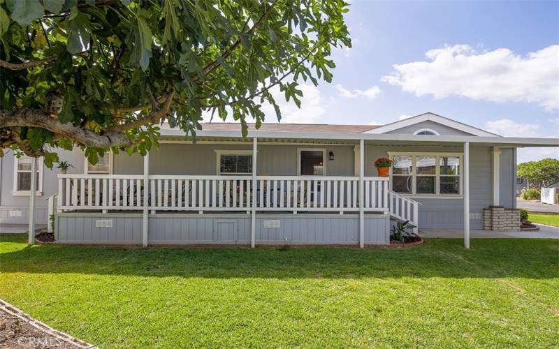 Enjoy the covered patio overlooking the yard