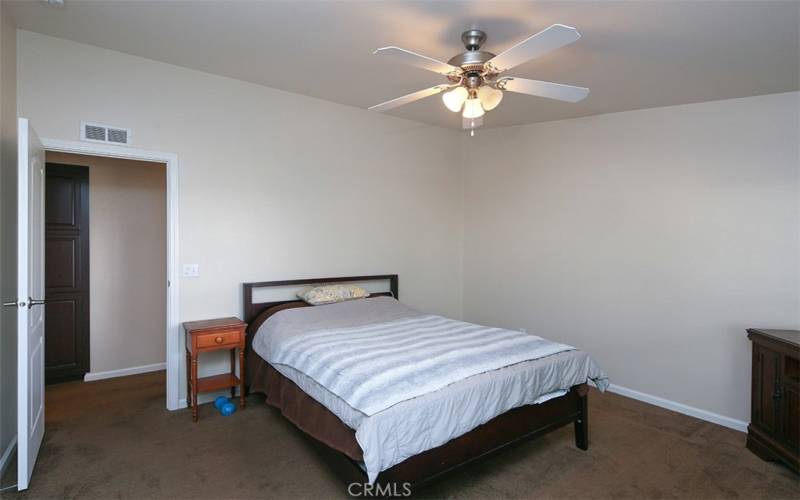 Third bedroom with ceiling fan