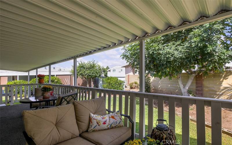 Two dining areas on covered patio