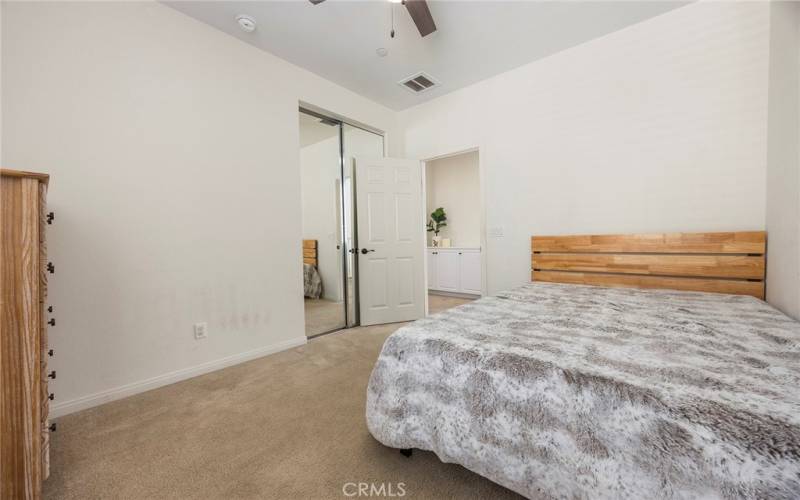 Bedroom #2 with ceiling fan.