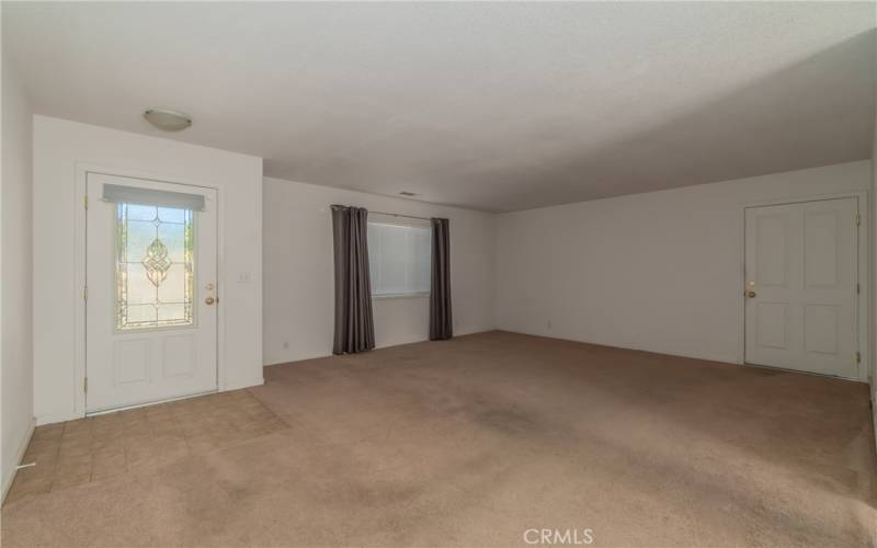 Living Room. Beautiful front door.