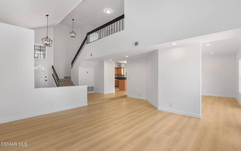 Living room view to stairs & entry