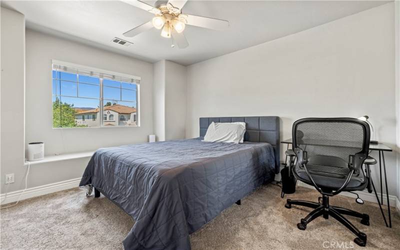 large guest bedroom with on suite bathroom