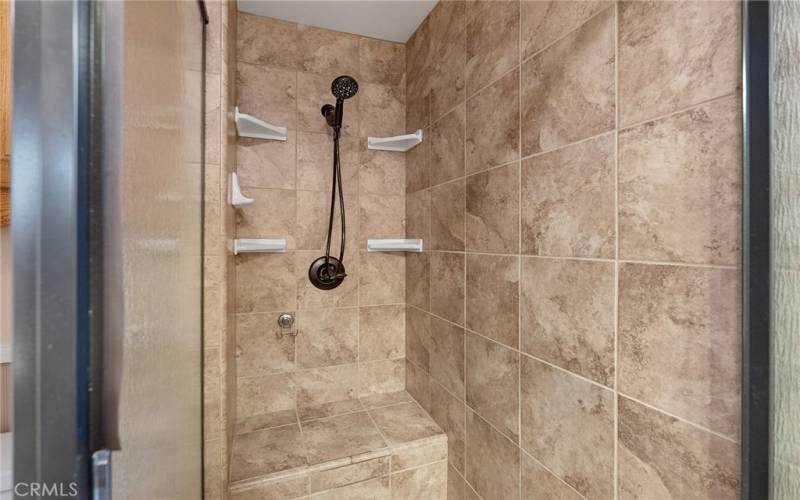 Large walk in shower in the primary suite