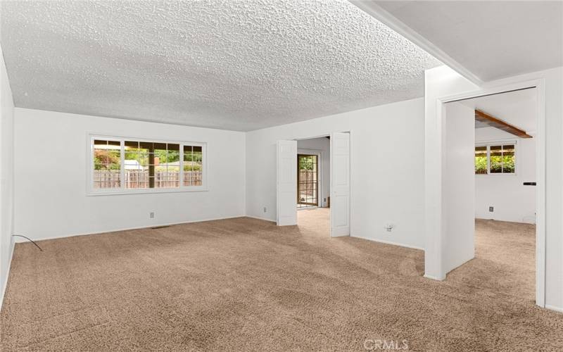 Extra large living room looking into the family room