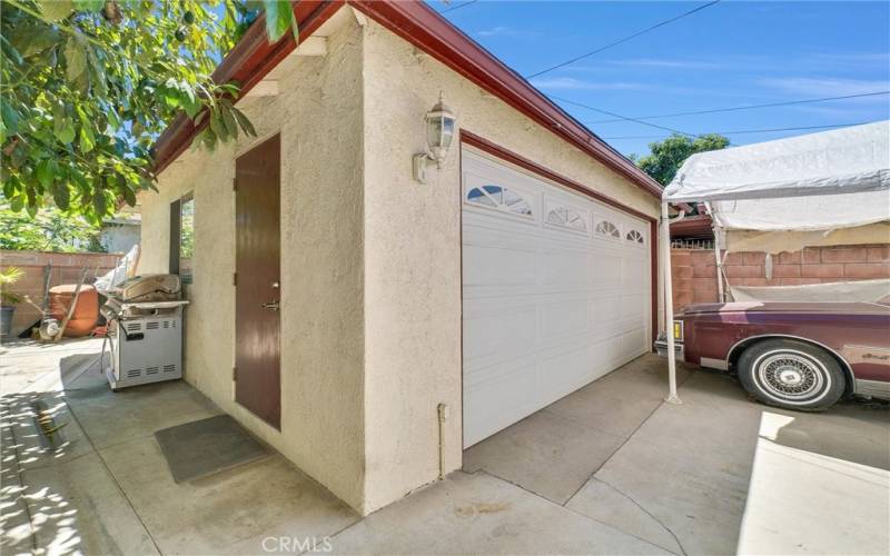 2 Car Garage finished walls with storage loft