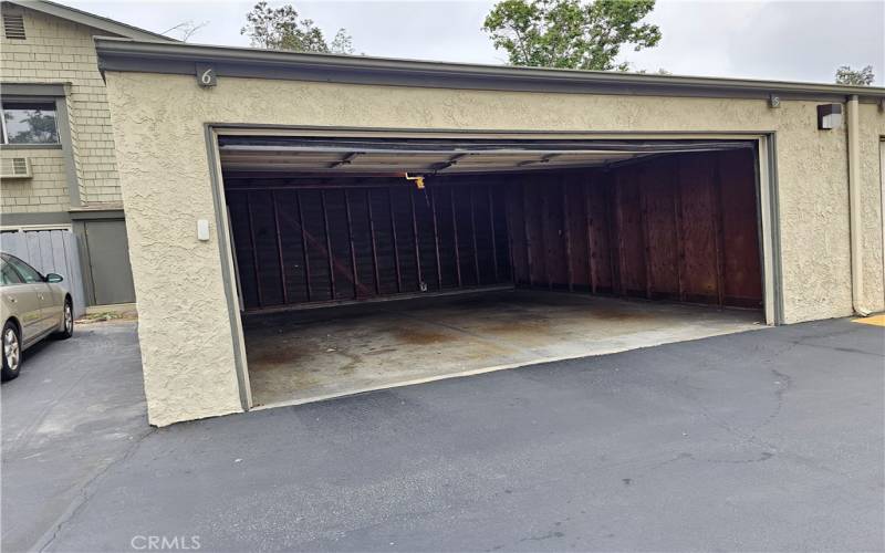 Garage space with remote control (shared with neighbor)