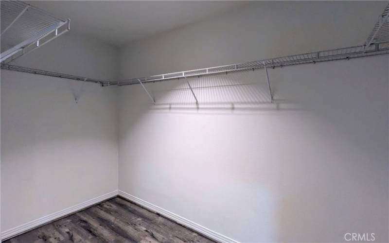 Primary Bedroom walk-in closet