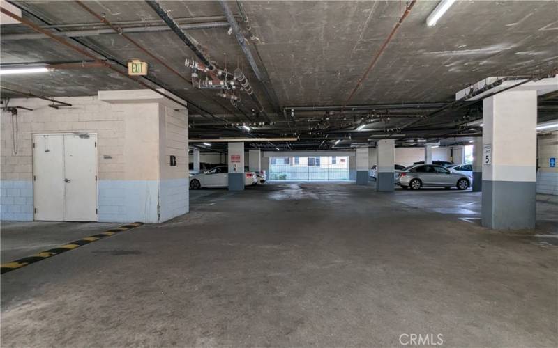 Gated parking garage with guest parking spaces