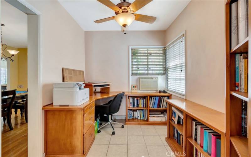 Custom built in desk and shelving, in former breakfast nook