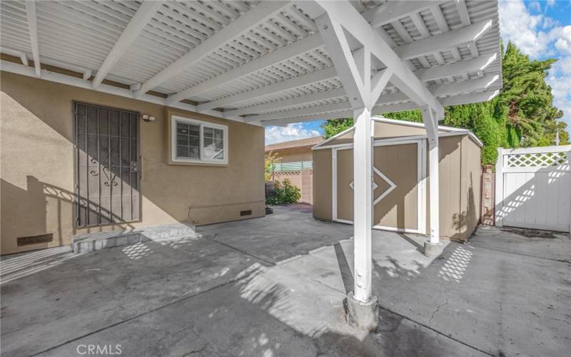 Covered patio/custom shed off kitchen