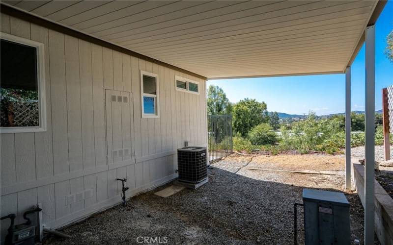 VIEW BEHIND YOUR SHED UNDER THE CARPORT