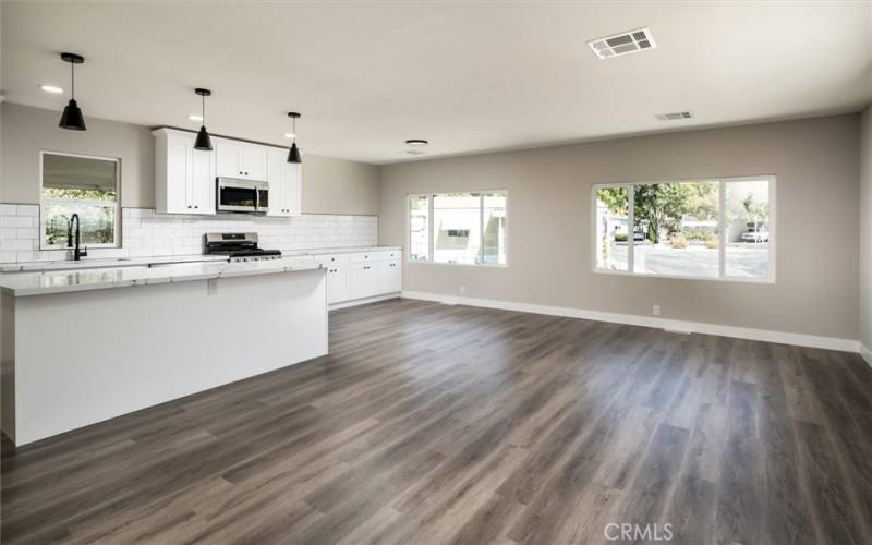 GREAT ROOM, KITCHEN IS WIDE OPEN TO LIVING AND DINING AREAS