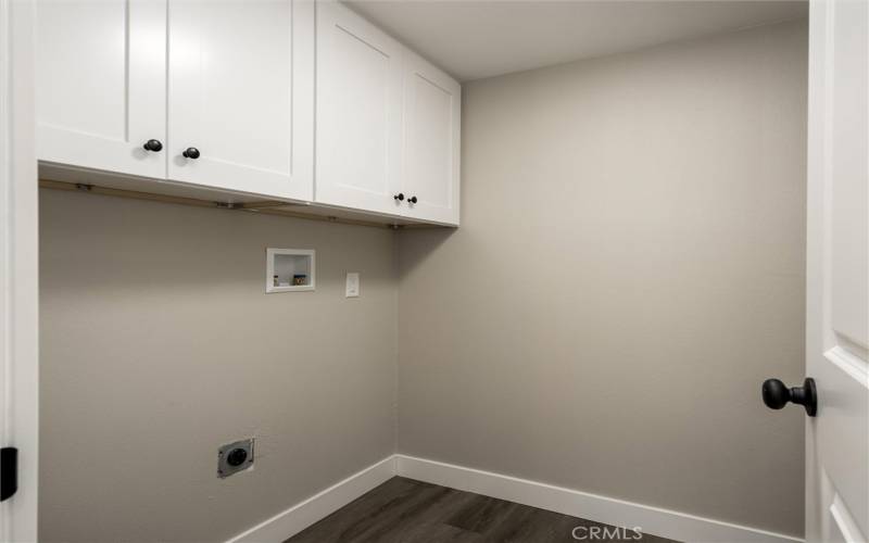 INDOOR LAUNDRY ROOM WITH STORAGE