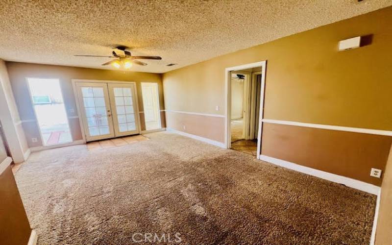 Second living room showing french door entrance.