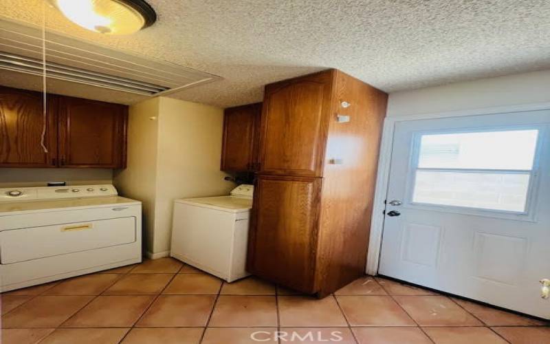 Laundry room to the right of the living room.