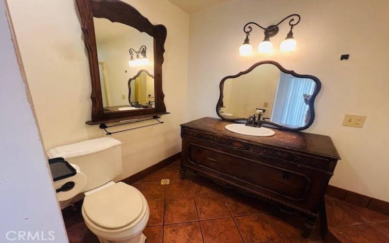 Primary bathroom with antique features.