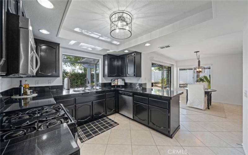 Spacious Chefs Kitchen with Bar Seating, Large Bay Window, Updated Light Fixtures