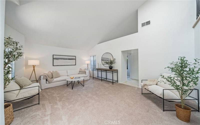 Living Room with access to kitchen and main floor office.