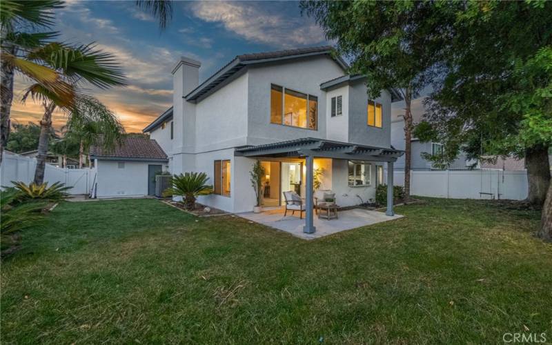 Large Back Yard with shade covered patio, a great place to enjoy the warm summer evenings with a lovely view of the city lights below!