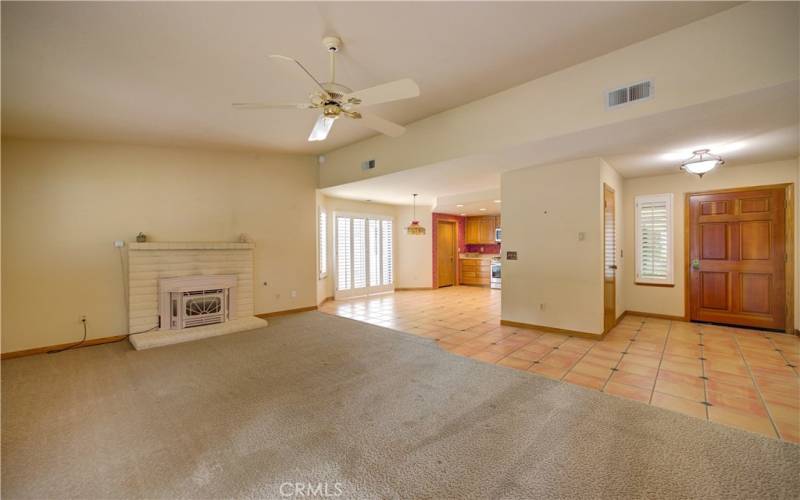 open concept living room with fireplace