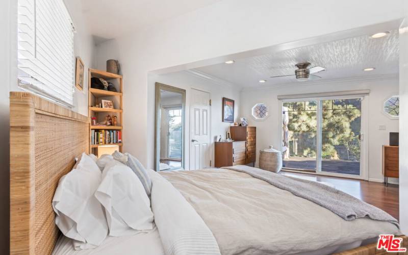 Master bedroom sliding doors lead to deck