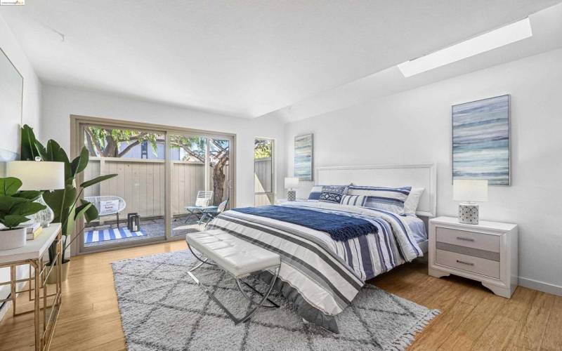 Primary bedroom with skylight