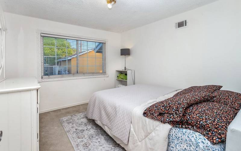 2 additional bright and airy bedrooms with glistening windows, ample closet space to maximize storage, paneled wardrobe doors and wall-to-wall carpet.