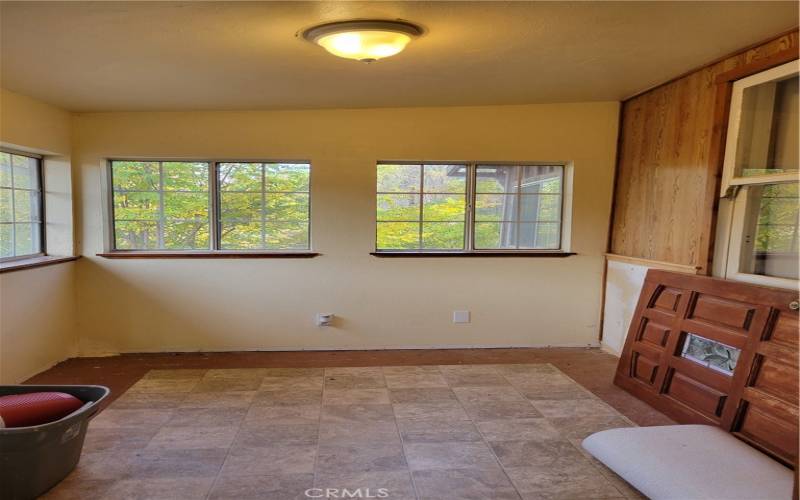 bonus room left of entry/mud room