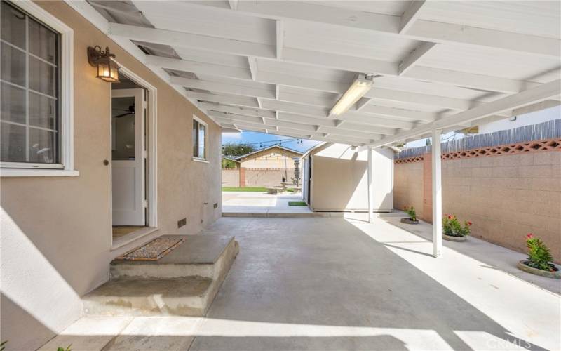 COVERED PATIO AREA OVER PRIMARY BEDROOM