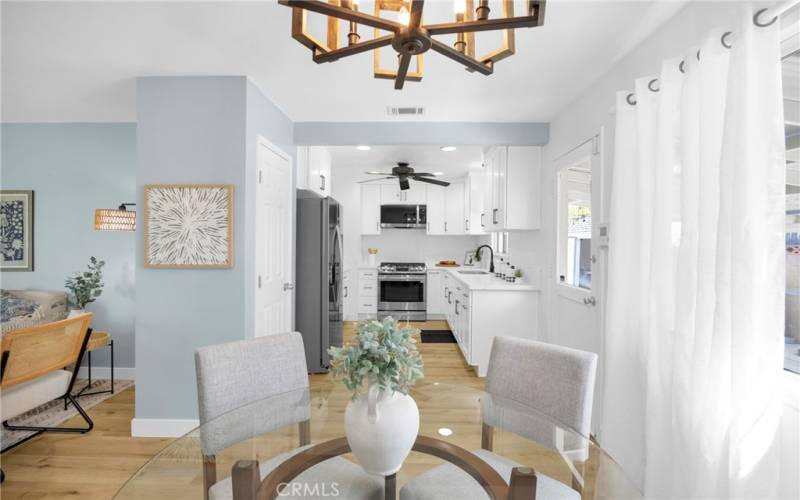 LOOKING FROM DINING ROOM AREA TO KITCHEN