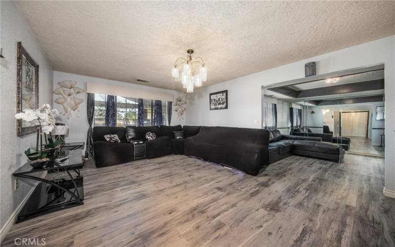 View of the front Formal Living Room and the Formal Dining Room to the right.