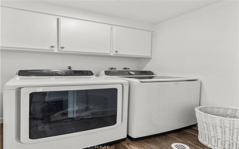 Upstairs Laundry room with washer and dryer included.