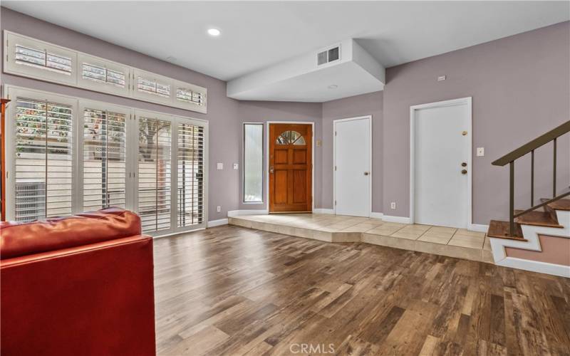 Inviting entry foyer steps into the open and bright floor plan.