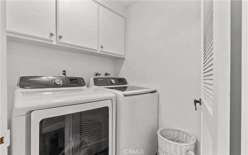 Upstairs Laundry room with washer and dryer included.