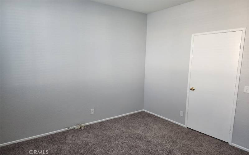 Main floor bedroom with closet