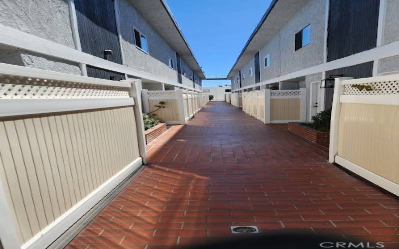 Main walkway to Condos, small quiet complex only 16 condo. NO ONE Above NO ONE below.