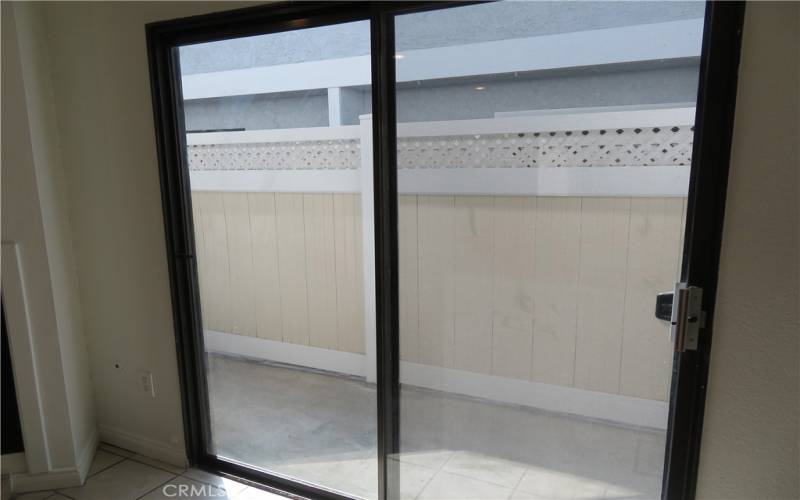 Sliding doors leading to private  enclosed patio.