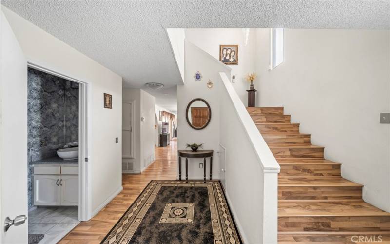 Entry area leading to 2nd Floor and downstairs bathroom