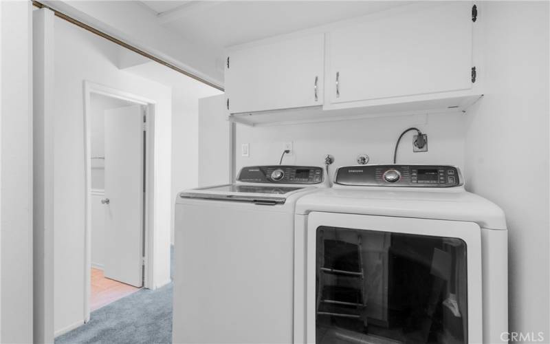 Washer and dryer room.