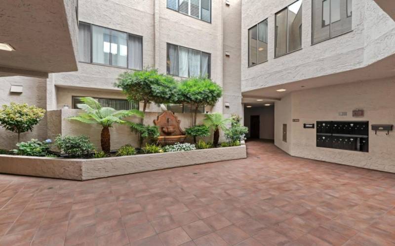 Common area atrium on way to condo unit