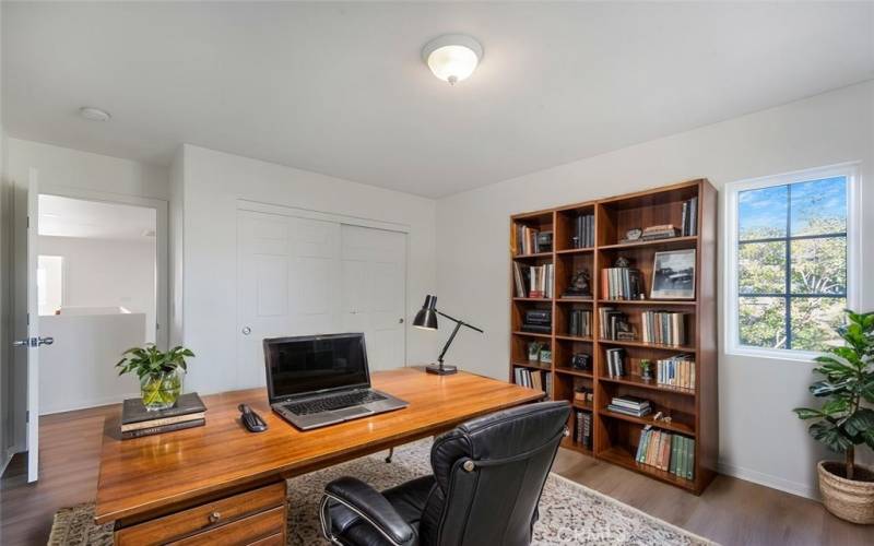 bedroom 2 left of the stair staged as a home office