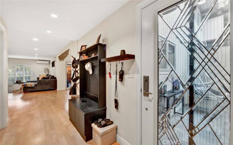 Entry Door to Foyer. Real Hardwood Flooring Throughout