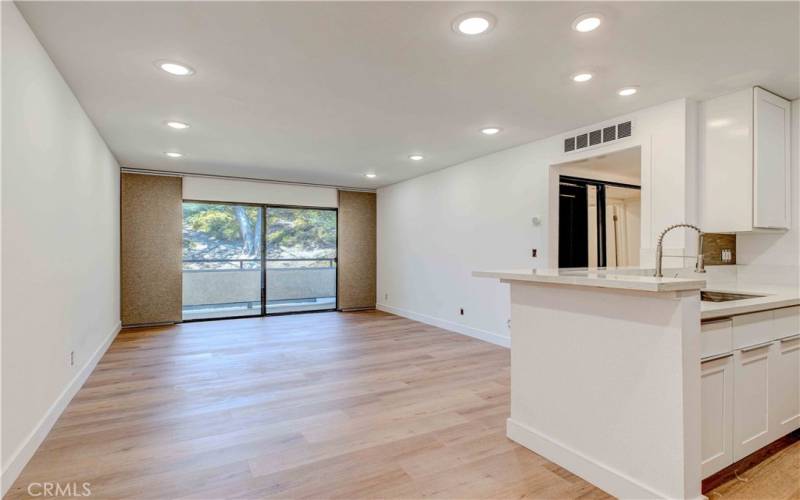 LIVING ROOM W/PRIVATE GREEN BALCONY