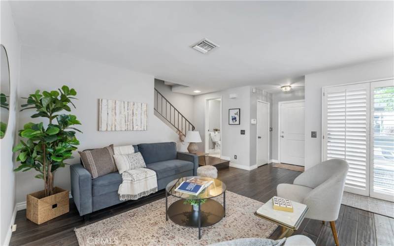 Living room to Entry and Upstairs