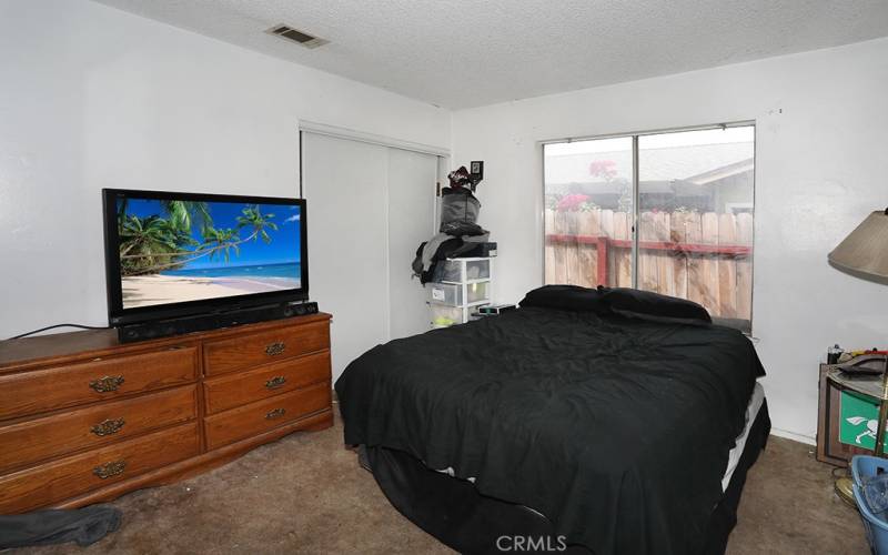 Guest bedroom with double doors could also be an office