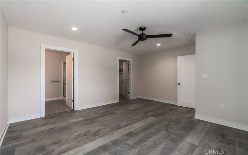 Primary Bedroom to walk in closet and bath.